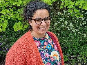 Huarda portrait glasses smiling